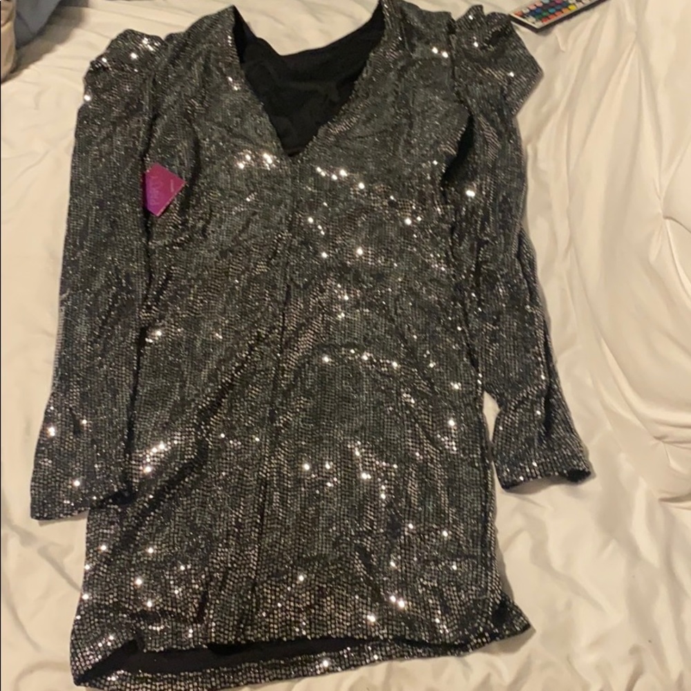 Sequin mini dress with low cut v